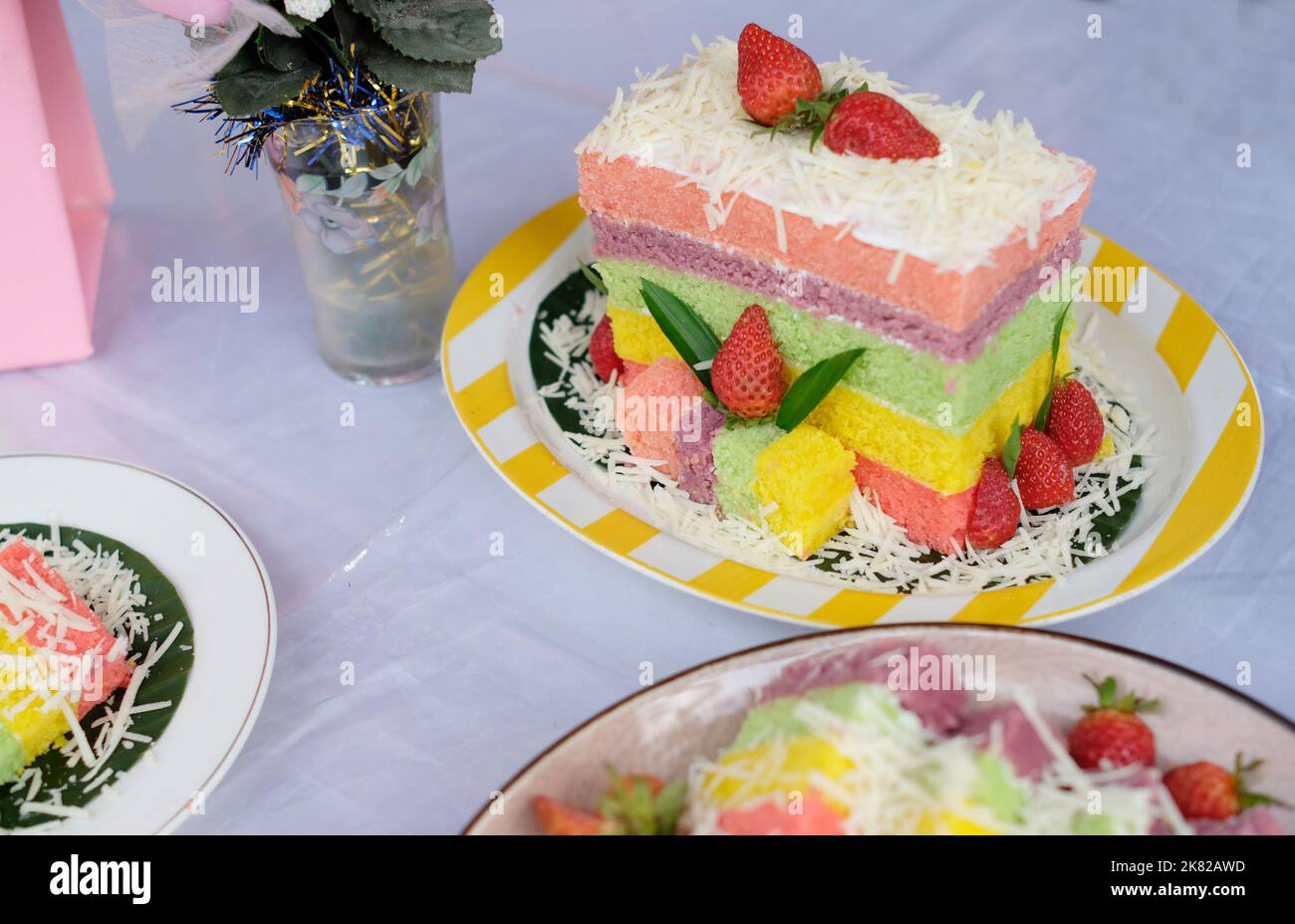 Rainbow Swirl Cake. Square rainbow cake on a plate Stock Photo