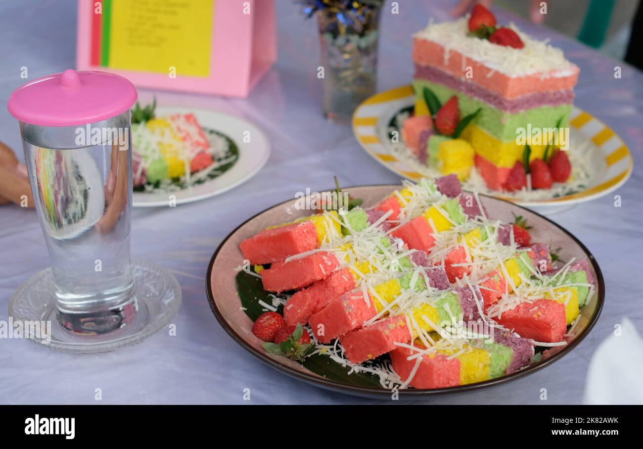 Rainbow Swirl Cake. Square rainbow cake on a plate Stock Photo
