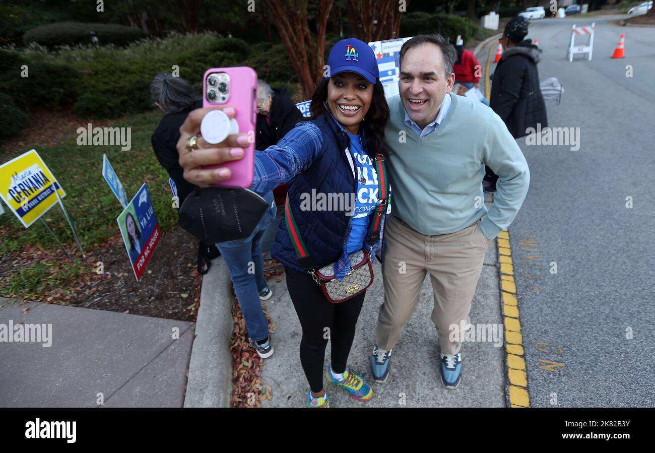 Cary, North Carolina, USA. 20th Oct, 2022. Voter CAMILLE KAUER take a selfie with Congressional candidate WILEY NICKEL in front of the Herbert C. Young Community Center in Cary, NC AS North Carolinians can now cast their ballots as the early voting period begins. Early voting lasts until Nov. 5 and will feature races from the US Senate to local seats for the 2022 midterm election with more than 350 one-stop voting sites. (Credit Image: © Bob Karp/ZUMA Press Wire) Credit: ZUMA Press, Inc./Alamy Live News Stock Photo