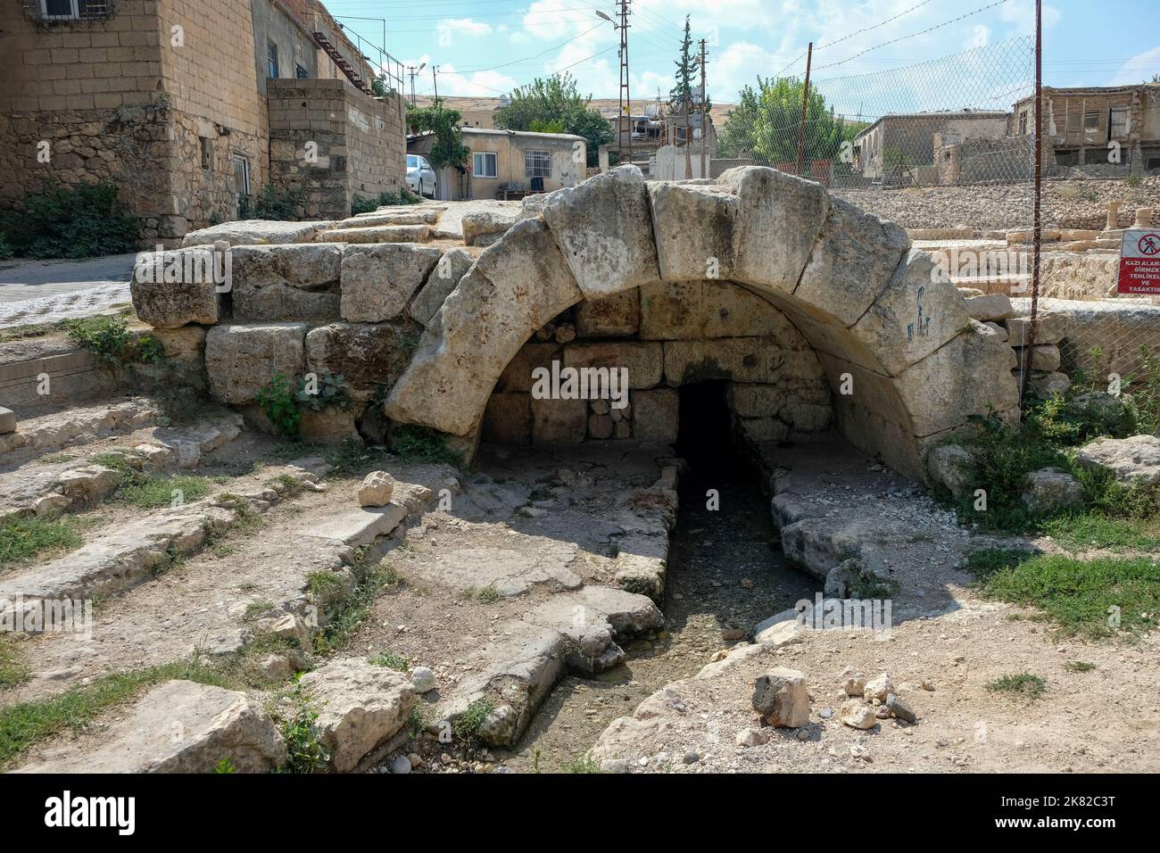 Archaeological excavations in the ancient city of Perre unearthed a historical Roman fountain, large blocks of stones, a furnace structure, water chan Stock Photo