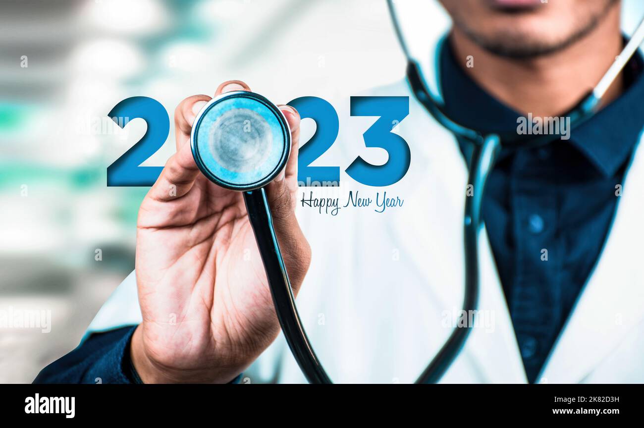 New Year 2023 Hospital concept image, Doctors hand with stethoscope Medical type Background Stock Photo