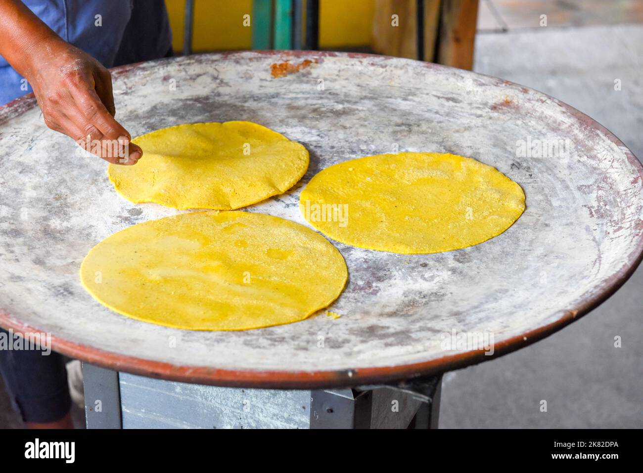 Tortilla making by hand, Oaxaca Mexico Stock Photo