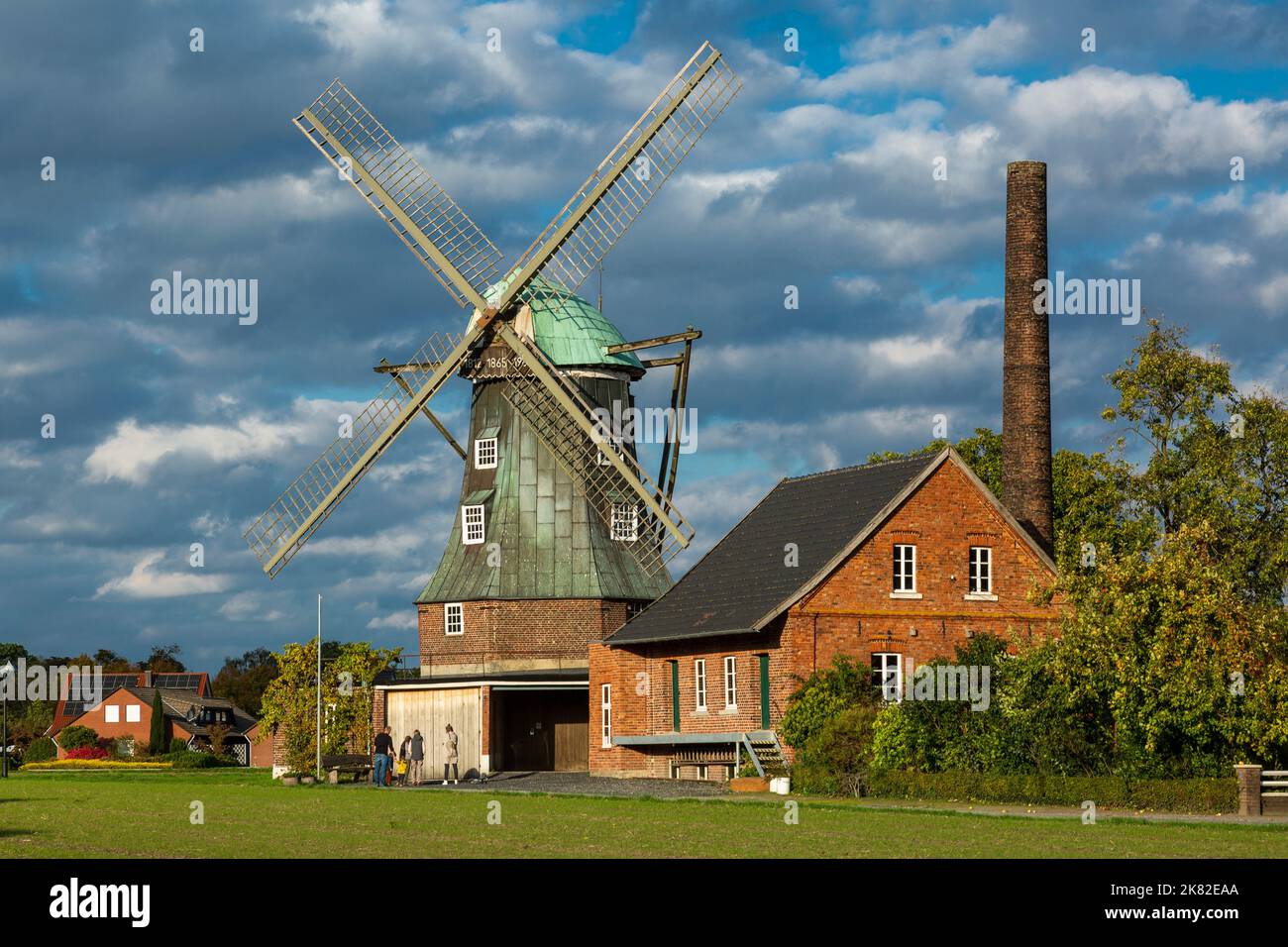 Germany, Suedlohn, Westmuensterland, Muensterland, Westphalia, North Rhine-Westphalia, NRW, Tower Windmill Menke, Dutch mill, octagonal hollaender mill, steam mill, chimney Stock Photo