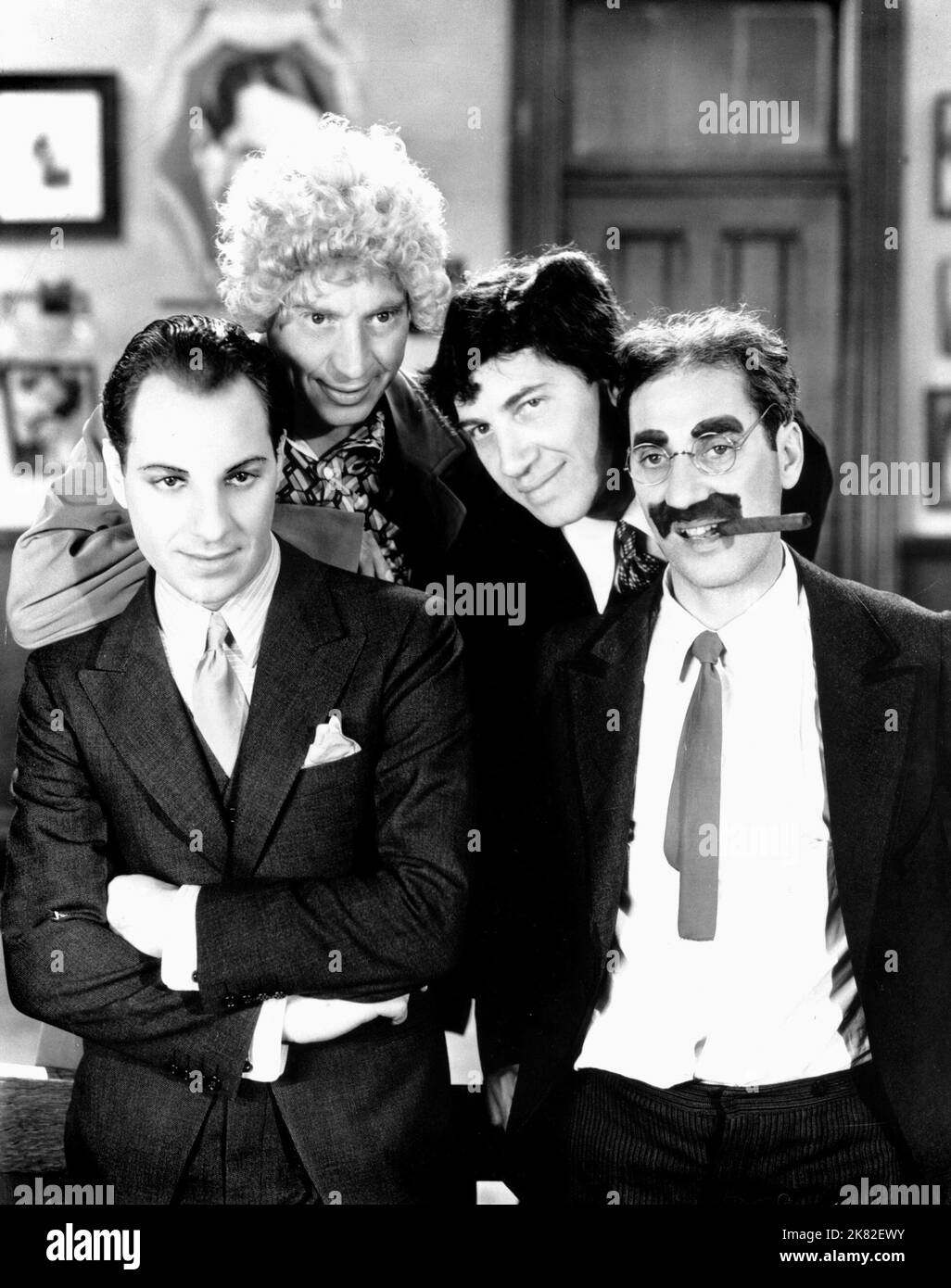 Zeppo Marx, Harpo Marx, Chico Marx & Groucho Marx Film: The Cocoanuts (USA 1929) Characters: Jamison, Harpo, Chico, Hammer  Director: Robert Florey & Joseph Santley 03 May 1929   **WARNING** This Photograph is for editorial use only and is the copyright of PARAMOUNT PICTURES and/or the Photographer assigned by the Film or Production Company and can only be reproduced by publications in conjunction with the promotion of the above Film. A Mandatory Credit To PARAMOUNT PICTURES is required. The Photographer should also be credited when known. No commercial use can be granted without written autho Stock Photo