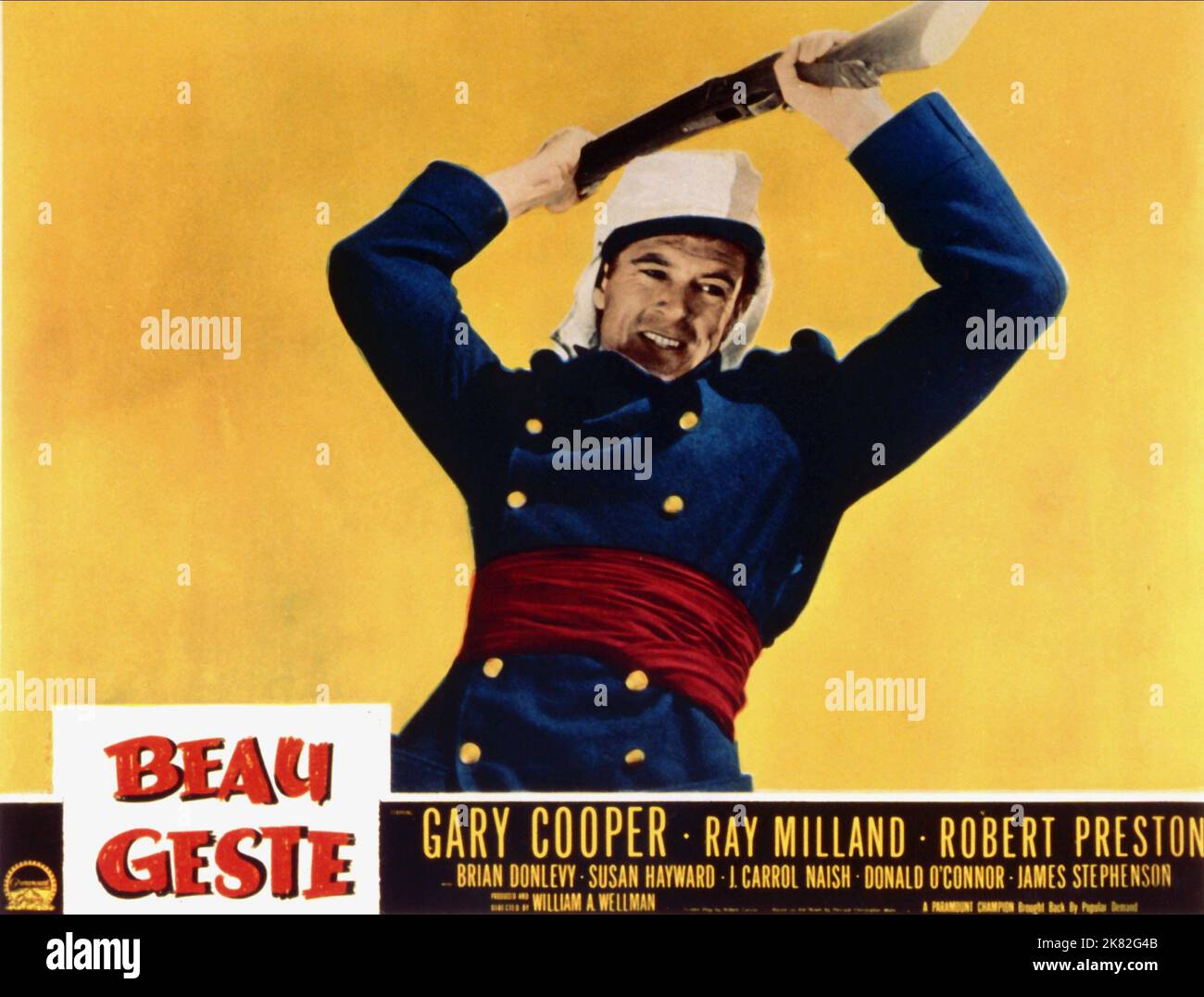 Gary Cooper Poster Film: Beau Geste (USA 1939)   Director: William A. Wellman 24 July 1939   **WARNING** This Photograph is for editorial use only and is the copyright of PARAMOUNT and/or the Photographer assigned by the Film or Production Company and can only be reproduced by publications in conjunction with the promotion of the above Film. A Mandatory Credit To PARAMOUNT is required. The Photographer should also be credited when known. No commercial use can be granted without written authority from the Film Company. Stock Photo