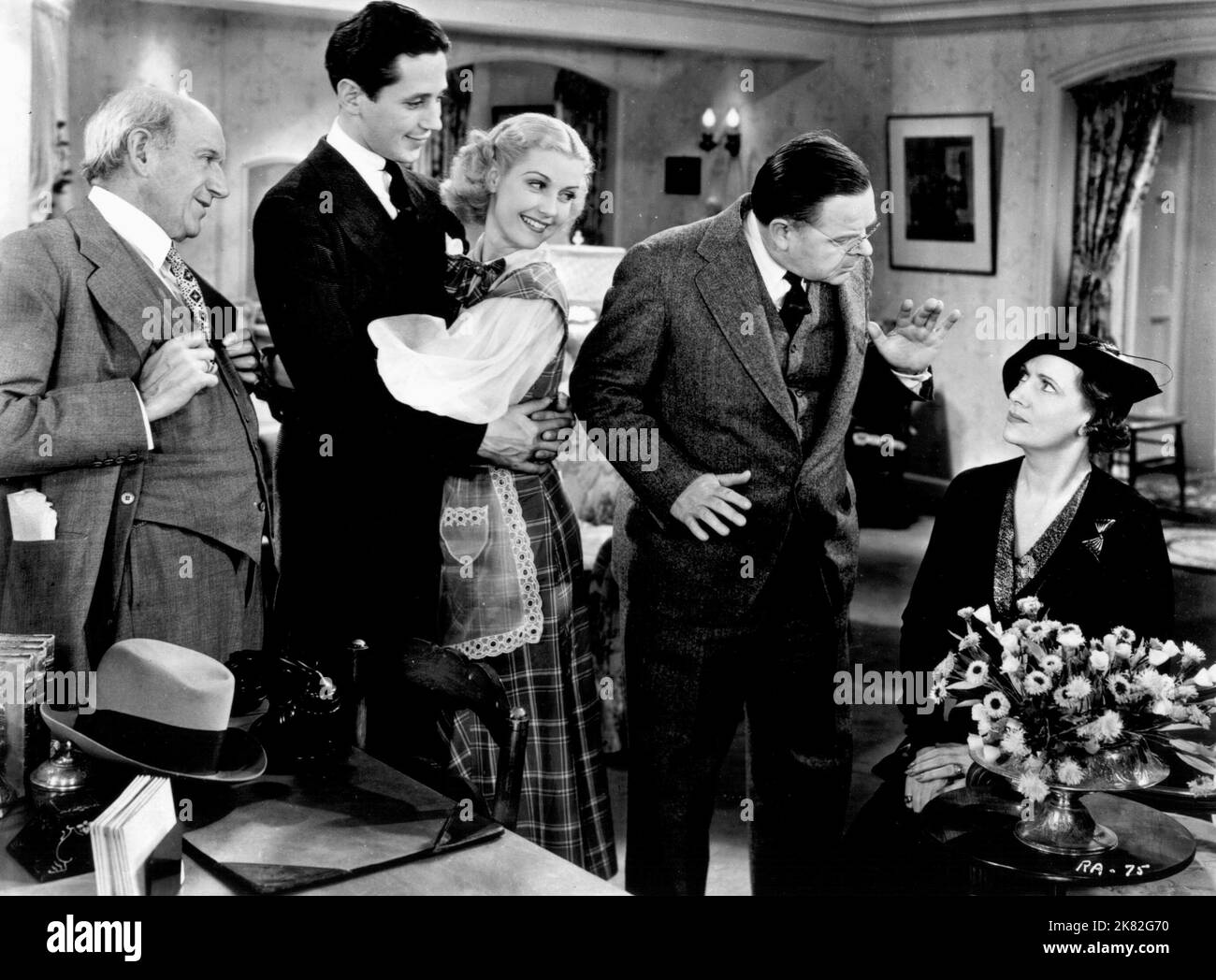 Joseph Cawthorn, Ross Alexander, Anita Louise, Gene Lockhart & Kathleen Lockhart Film: Brides Are Like That (1937) Characters: Fred Schultz, Bill McAllister, Hazel Robinson, John Robinson, Mrs. Ella Robinson  Director: William C. Mchann 22 March 1936   **WARNING** This Photograph is for editorial use only and is the copyright of WARNER BRO and/or the Photographer assigned by the Film or Production Company and can only be reproduced by publications in conjunction with the promotion of the above Film. A Mandatory Credit To WARNER BRO is required. The Photographer should also be credited when kno Stock Photo