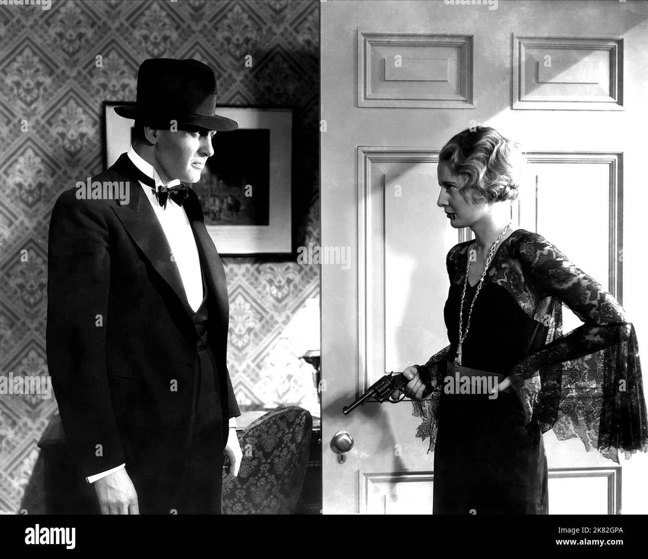 Ralph Bellamy & Barbara Stanwyck  Film Forbidden (USA 1932) Characters: Holland, Lulu  Director: Frank Capra 09 January 1932   **WARNING** This Photograph is for editorial use only and is the copyright of COLUMBIA PICTURES and/or the Photographer assigned by the  Film or Production Company and can only be reproduced by publications in conjunction with the promotion of the above  Film. A Mandatory Credit To COLUMBIA PICTURES is required. The Photographer should also be credited when known. No commercial use can be granted without written authority from the  Film Company. Stock Photo