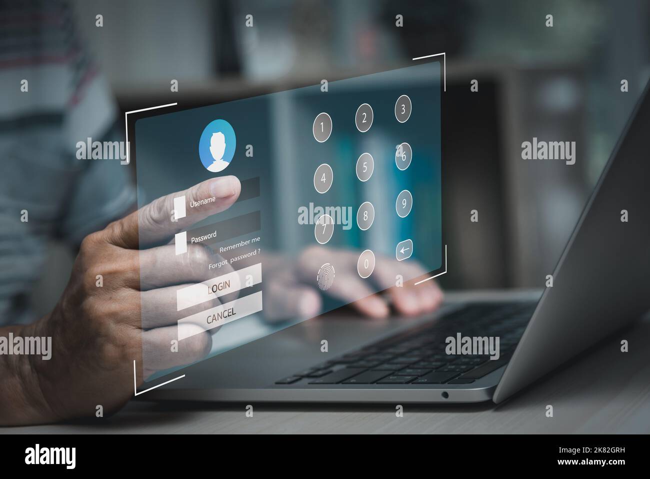 man using laptop computer and sign up or log in username password virtual touch screen. Stock Photo