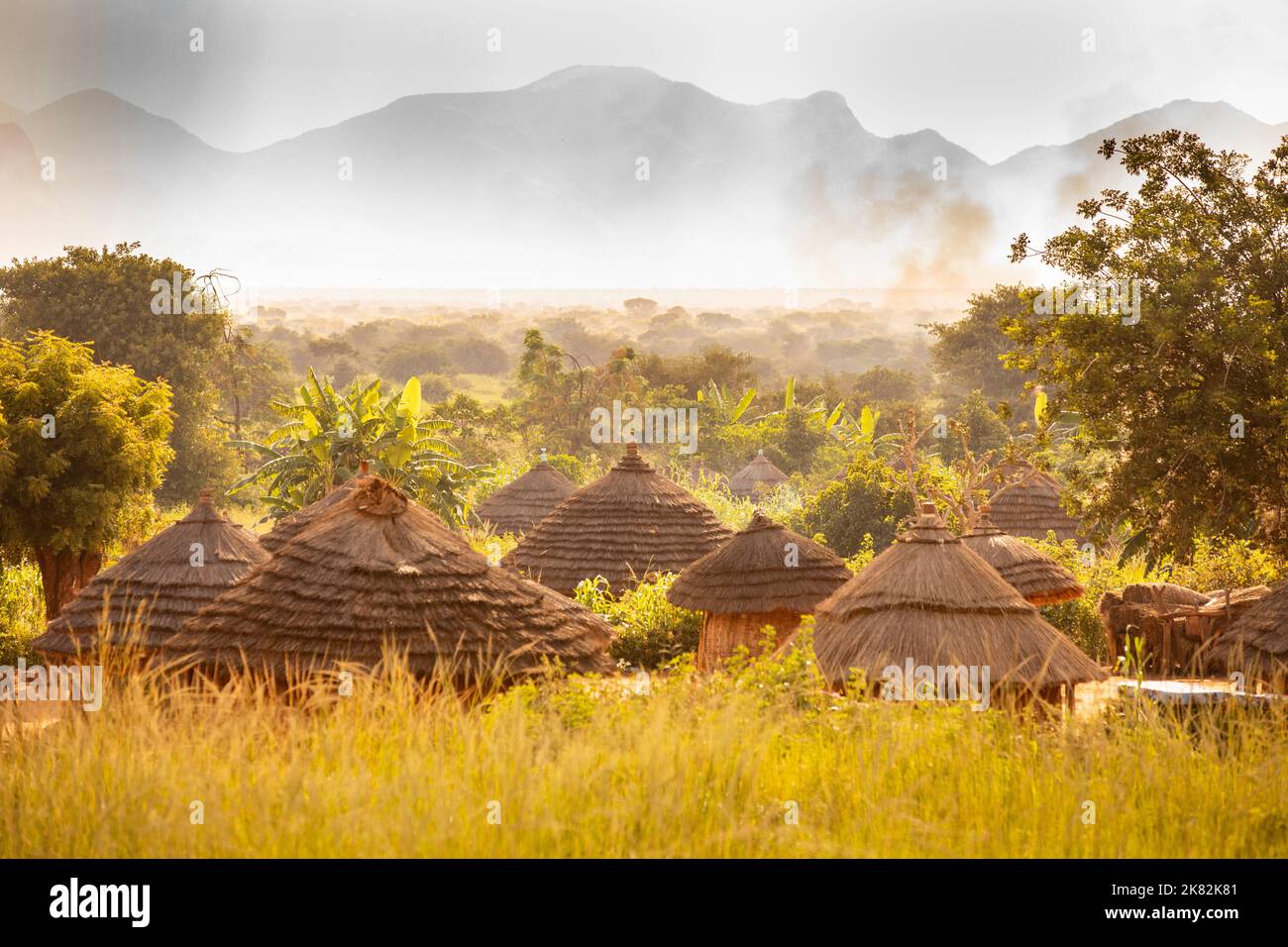 Uganda's Abim district is marked by mud and grass thatch villages and dramatic mountain scenery. Uganda, East Africa. Stock Photo