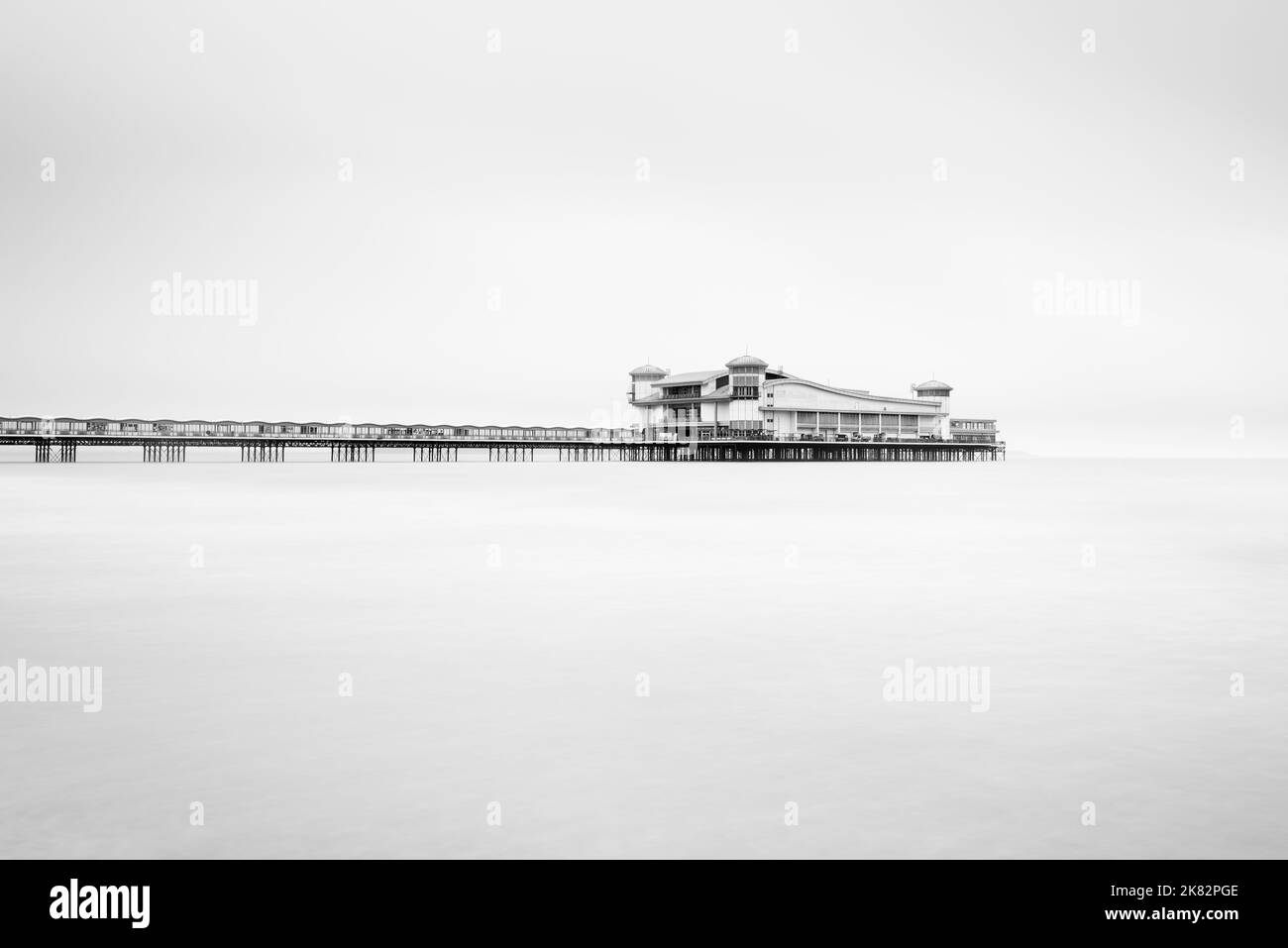 A black and white image of the Grand Pier in the Bristol Channel at Weston-super-Mare, North Somerset, England. Stock Photo