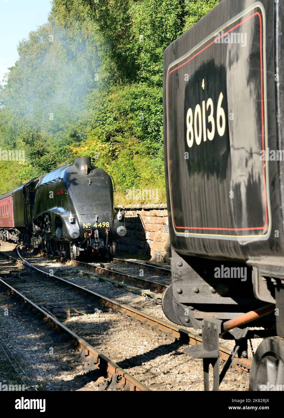 Class A4 Pacific Sir Nigel Gresley arriving at Goathland station as the BR Standard tank No 80136 waits to depart for Grosmont, NYMR. 23.09.2022. Stock Photo