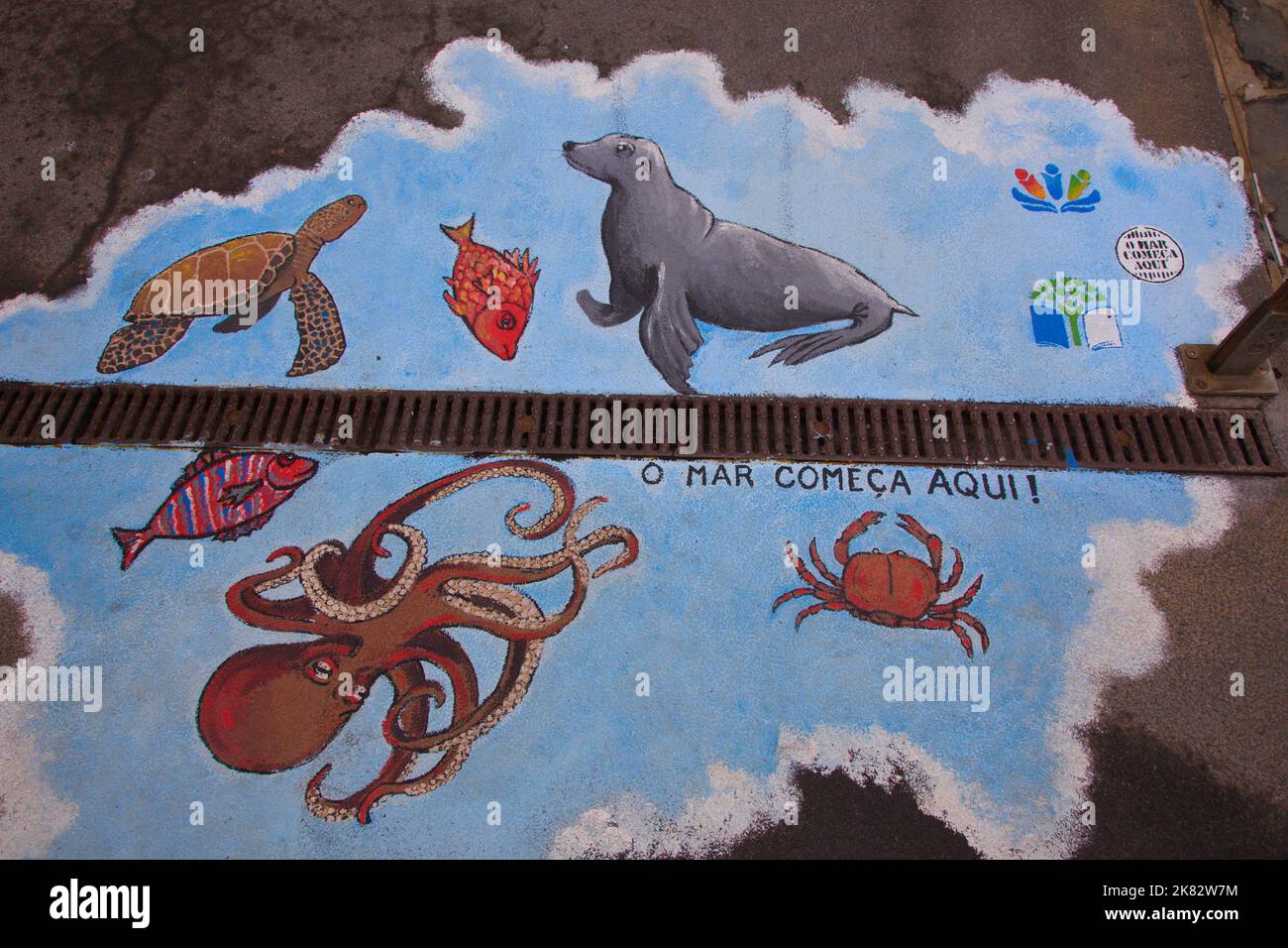 Portugal, Madeira, Camara de Lobos, fishing village, graffiti on sidewalk, the sea begins here, Stock Photo