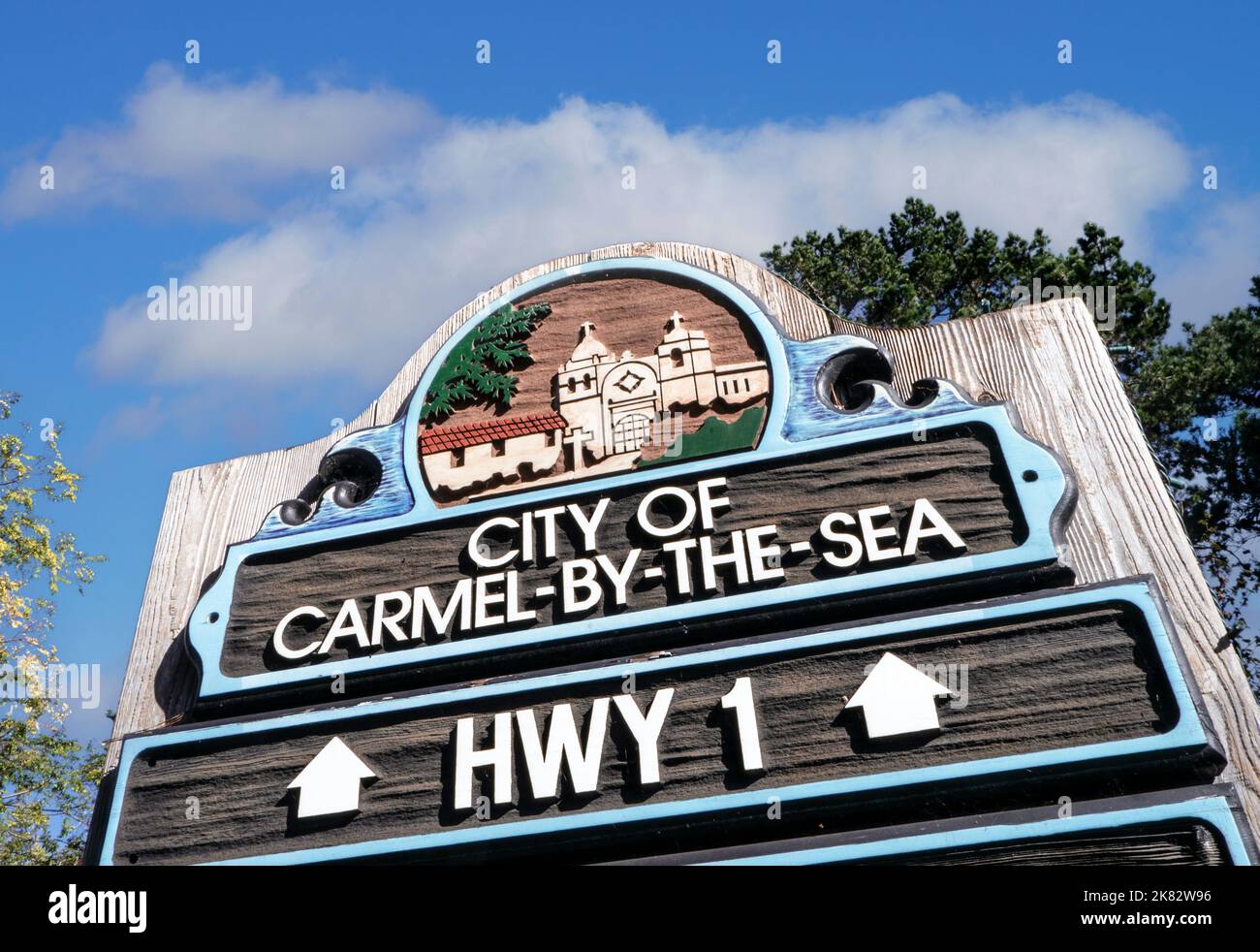 Highway 1 Carmel Sign California Rustic wooden road sign at entrance to Carmel-by-the-Sea a popular smart upmarket coastal village California USA Stock Photo