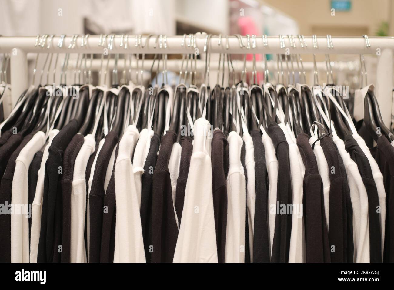black and white color women cloths display for sale Stock Photo - Alamy