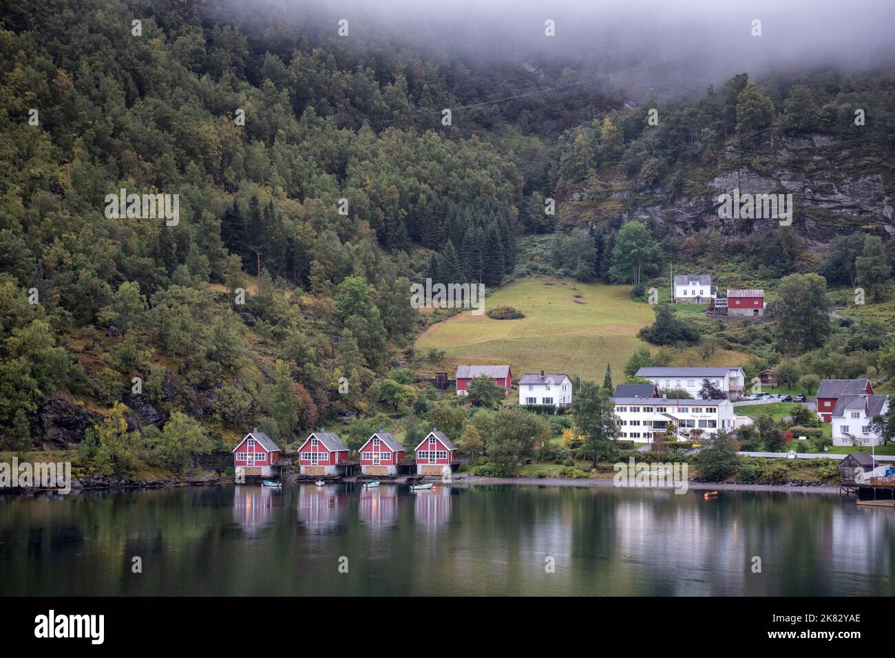 Norwegian tourist red houses and fishing boats in fjords, Flam, Norway