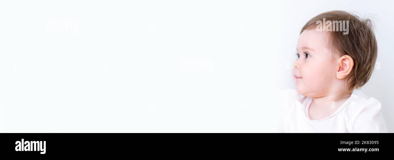 Banner portrait of curious child on white background, little caucasian ...
