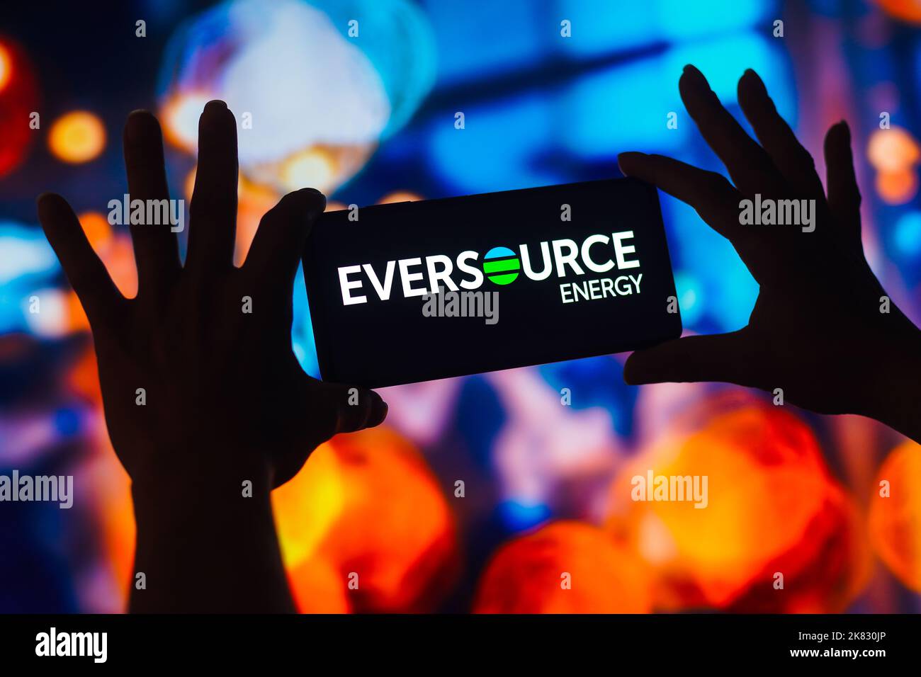 In this photo illustration, the Eversource Energy logo is displayed on ...