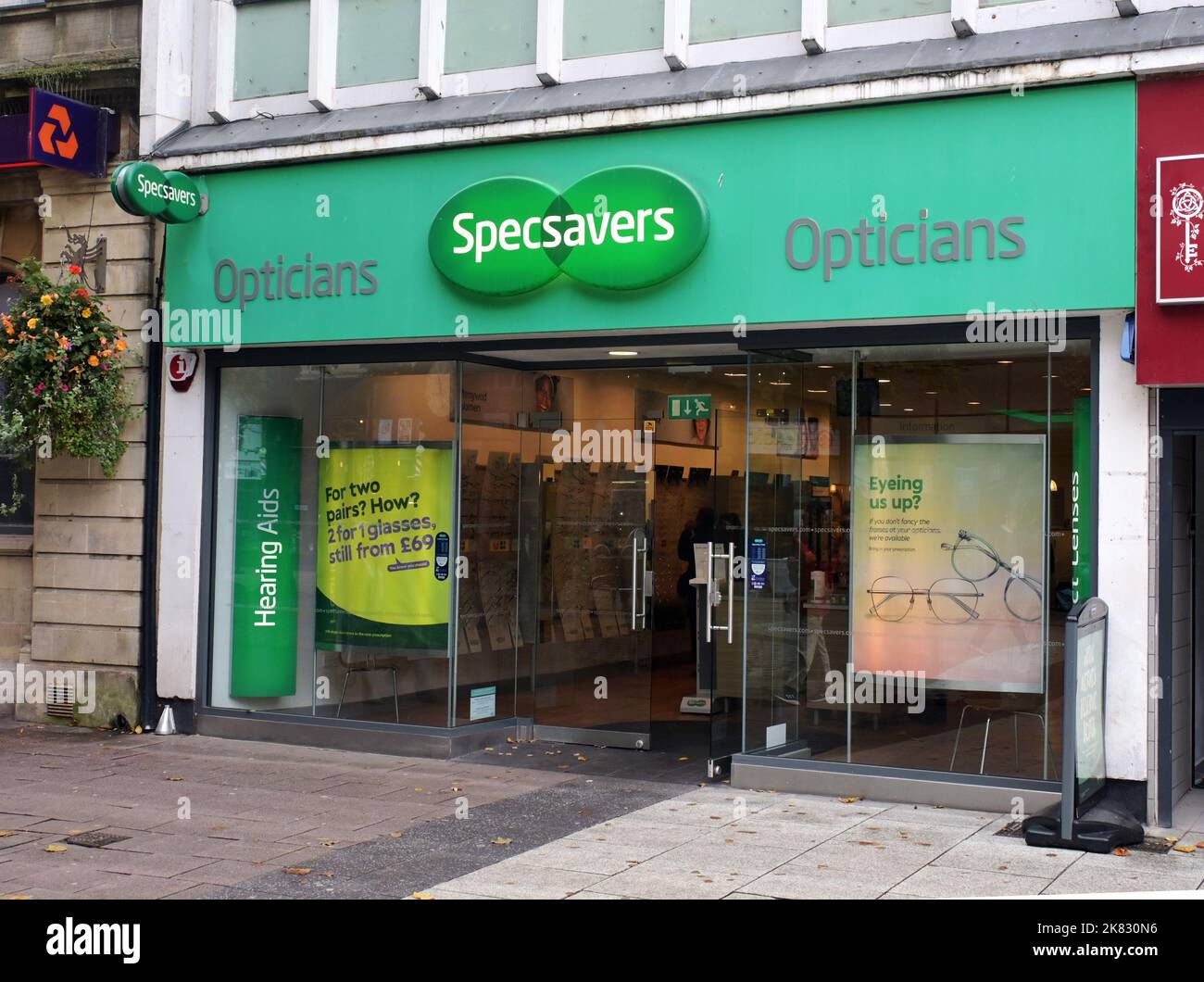 Shops and restaurants in Cardiff city centre. Specsavers opticians