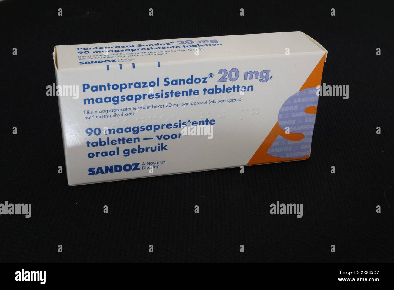 Photo of package of pantoprazole capsules ('pantoprazol' in dutch), produced by Sandoz, a Novartis division Stock Photo