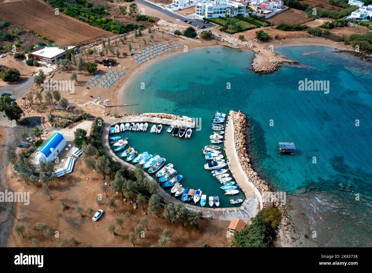 Aerial view of Agia Triada beach (Trinity Beach) and harbour, Paralimni, Cyprus. Stock Photo