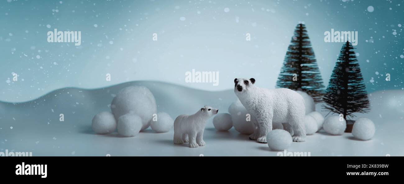 Cozy blue winter banner backdrop, bears in snowdrifts. Concept for Christmas and New Year Stock Photo