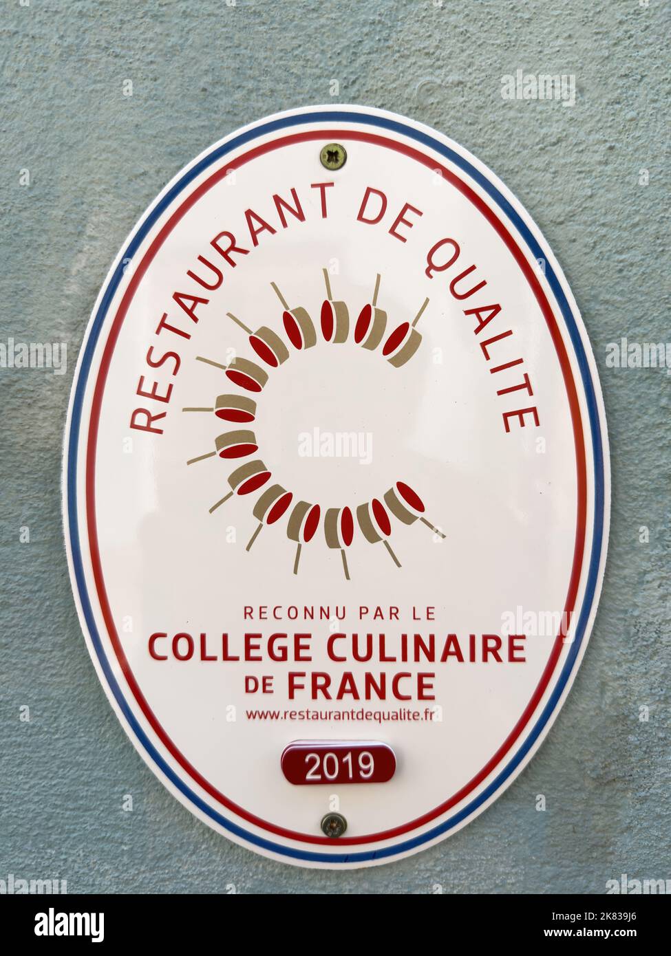 Ribeauville, France - Sep 22, 2022: Signage at the entrance of restaurant - restaurant de qualite recognized by the College Culinaire de France Stock Photo