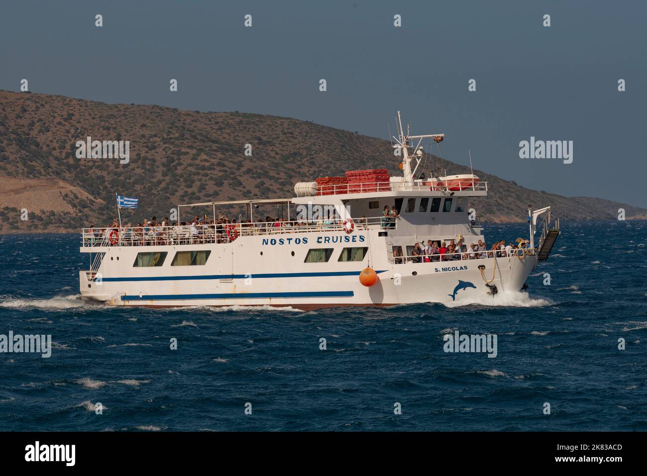 Agios Nikolaos, Crete, Greece. 2022. Tour boat returning to Agios Nikolaos with passengers from Spinalonga Island excursion. Stock Photo