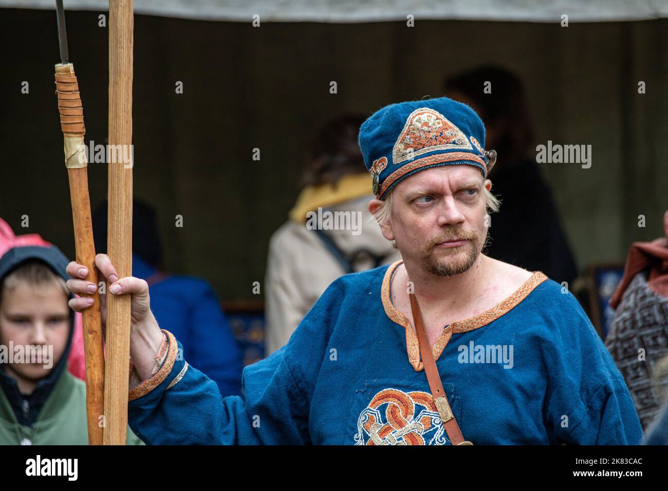 Male reenactor at Pukkisaari Iron Age Market reenactment in Vähä-Meilahti district of Helsinki, Finland Stock Photo