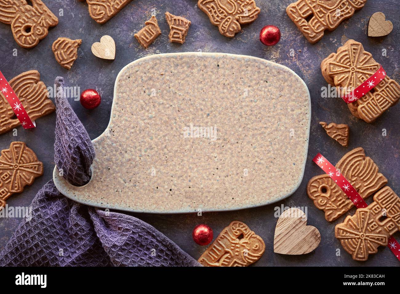 Speculoos or Spekulatius, Christmas biscuits, chocolate balls and stripy  towel on dark background. Traditional German sweets, cookies for Xmas,  Advent Stock Photo - Alamy