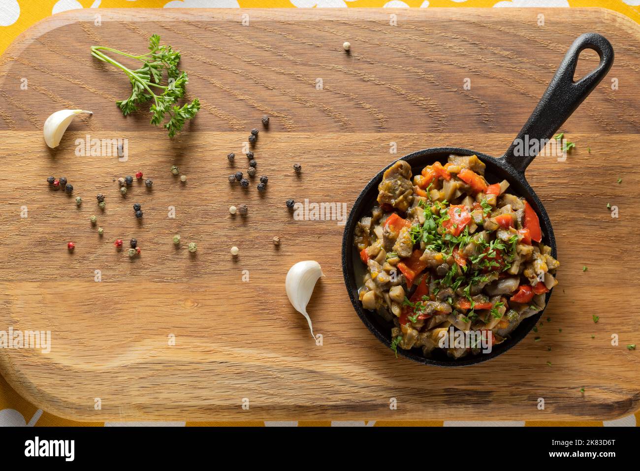 Mushroom stew with a lot of vegetables on a rustic background - top view Stock Photo