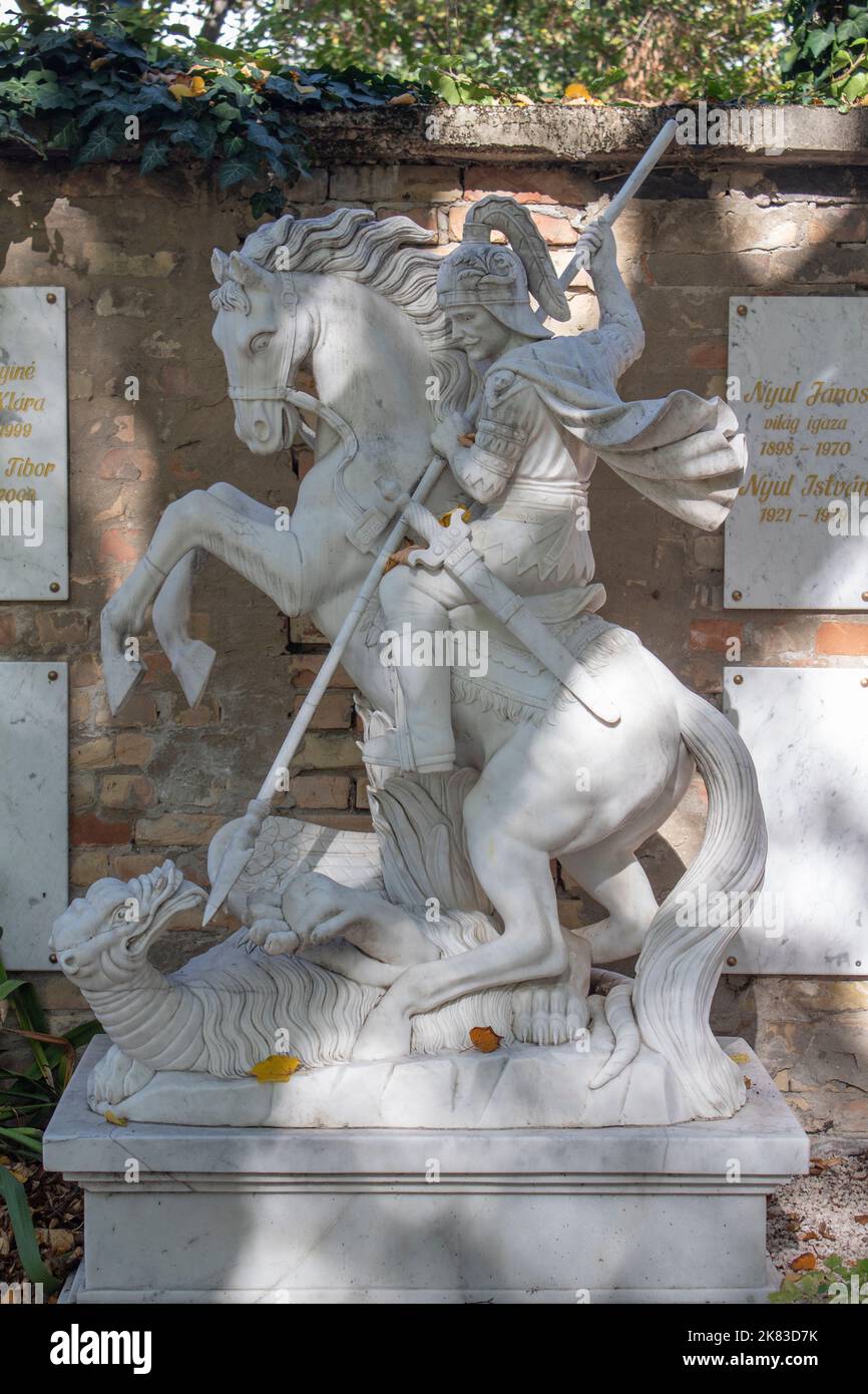 George and the dragon statue on a grave in Kerepesi Cemetery, Budapest Hungary Stock Photo