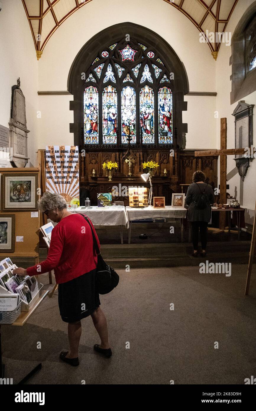 Visitors inspect the Art & Craft works exhibited by local residents ito