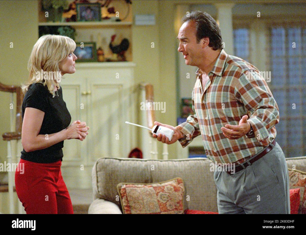 Courtney Thorne-Smith & James Belushi Television: According To Jim (2001) Characters: Cheryl (182 episodes, 2001-2009), Jim  03 October 2001   **WARNING** This Photograph is for editorial use only and is the copyright of ABC and/or the Photographer assigned by the Film or Production Company and can only be reproduced by publications in conjunction with the promotion of the above Film. A Mandatory Credit To ABC is required. The Photographer should also be credited when known. No commercial use can be granted without written authority from the Film Company. Stock Photo