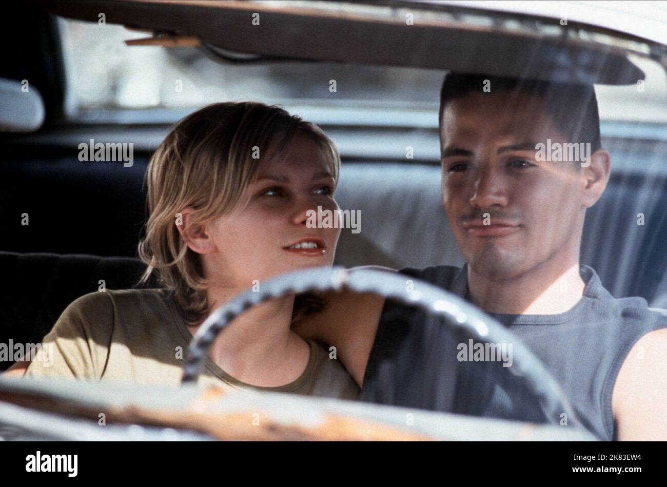 Kirsten Dunst & Jay Hernandez Film: Crazy/Beautiful (2001) Characters: Nicole & Carlos  Director: John Stockwell 28 June 2001   **WARNING** This Photograph is for editorial use only and is the copyright of WALT DISNEY and/or the Photographer assigned by the Film or Production Company and can only be reproduced by publications in conjunction with the promotion of the above Film. A Mandatory Credit To WALT DISNEY is required. The Photographer should also be credited when known. No commercial use can be granted without written authority from the Film Company. Stock Photo