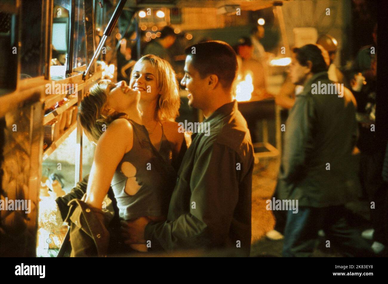 Kirsten Dunst, Taryn Manning, Jay Hernandez Film: Crazy/Beautiful (2001) Characters: Nicole,Maddy,Carlos  Director: John Stockwell 28 June 2001   **WARNING** This Photograph is for editorial use only and is the copyright of WALT DISNEY and/or the Photographer assigned by the Film or Production Company and can only be reproduced by publications in conjunction with the promotion of the above Film. A Mandatory Credit To WALT DISNEY is required. The Photographer should also be credited when known. No commercial use can be granted without written authority from the Film Company. Stock Photo