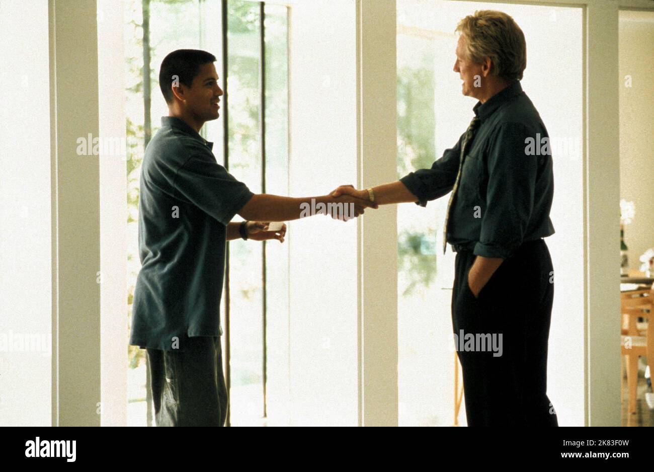 Jay Hernandez & Bruce Davison Film: Crazy/Beautiful (2001) Characters: Carlos & Tom Oakley  Director: John Stockwell 28 June 2001   **WARNING** This Photograph is for editorial use only and is the copyright of WALT DISNEY and/or the Photographer assigned by the Film or Production Company and can only be reproduced by publications in conjunction with the promotion of the above Film. A Mandatory Credit To WALT DISNEY is required. The Photographer should also be credited when known. No commercial use can be granted without written authority from the Film Company. Stock Photo