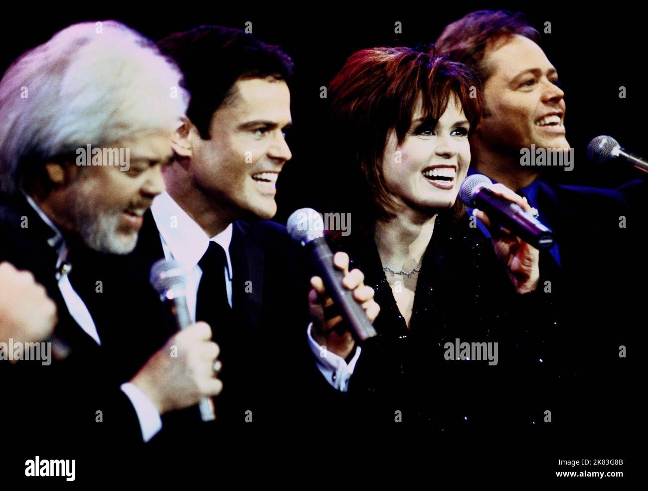 Merrill Osmond, Donny Osmond, Marie Osmond & Jimmy Osmond Film: Inside The Osmonds (2001) Characters: Himself,Himself,Herself & Himself  Director: Neill Fearnley 05 February 2001   **WARNING** This Photograph is for editorial use only and is the copyright of ABC and/or the Photographer assigned by the Film or Production Company and can only be reproduced by publications in conjunction with the promotion of the above Film. A Mandatory Credit To ABC is required. The Photographer should also be credited when known. No commercial use can be granted without written authority from the Film Company. Stock Photo
