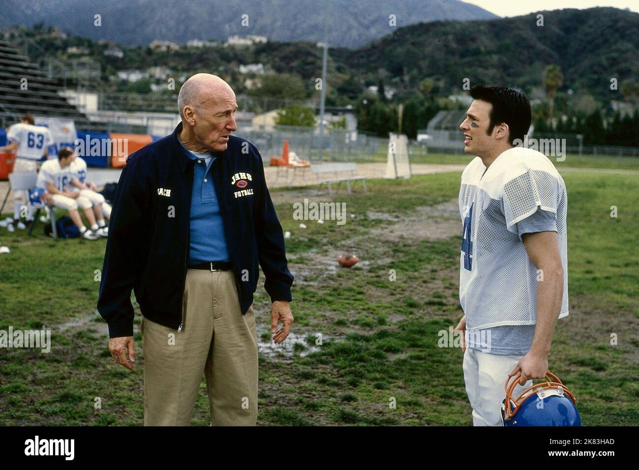 Ed Lauter & Chris Evans Film: Not Another Teen Movie (2001) Characters: The Coach & Jake Wyler  Director: Joel Gallen 07 December 2001   **WARNING** This Photograph is for editorial use only and is the copyright of COLUMBIA and/or the Photographer assigned by the Film or Production Company and can only be reproduced by publications in conjunction with the promotion of the above Film. A Mandatory Credit To COLUMBIA is required. The Photographer should also be credited when known. No commercial use can be granted without written authority from the Film Company. Stock Photo