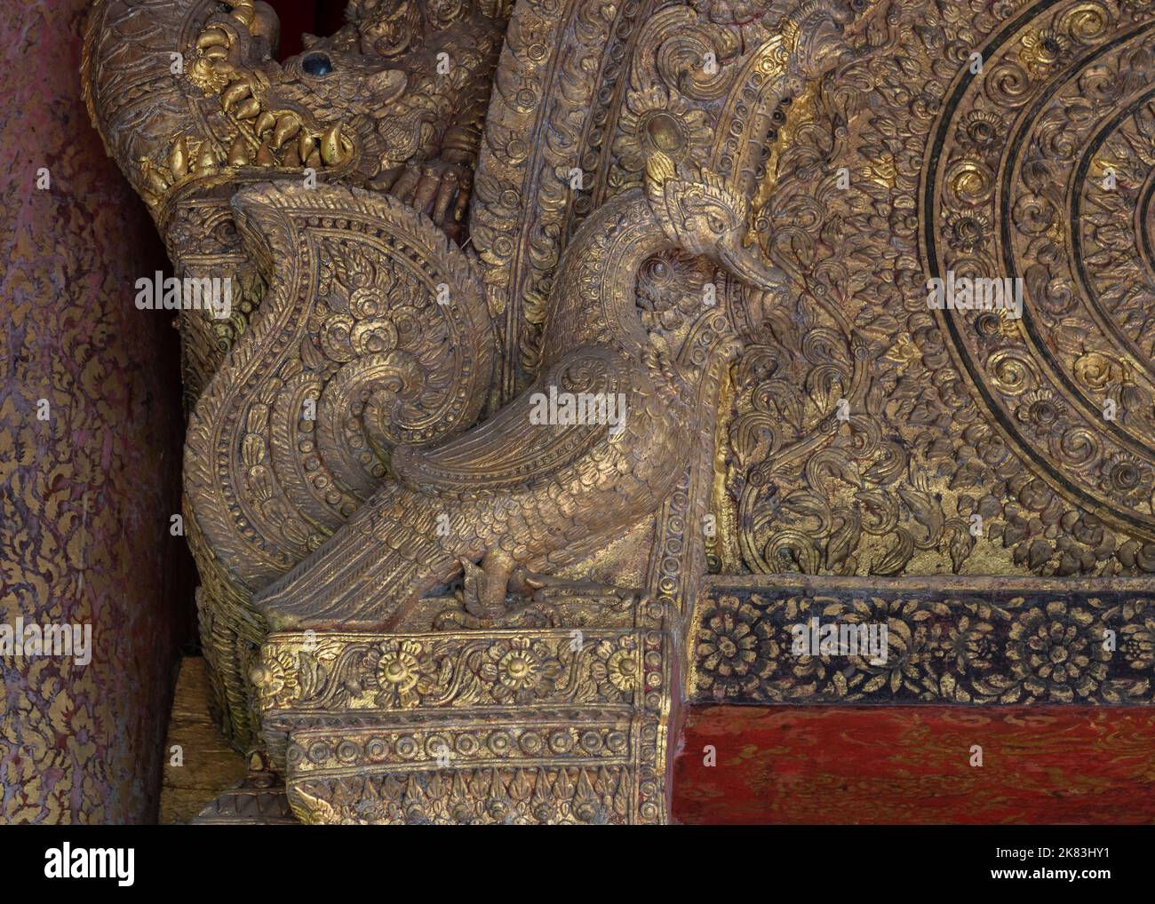 Old carving of mythical swan bird aka hong or hangsa at entrance of historic viharn Lai Kham, Wat Phra Singh buddhist temple, Chiang Mai, Thailand Stock Photo