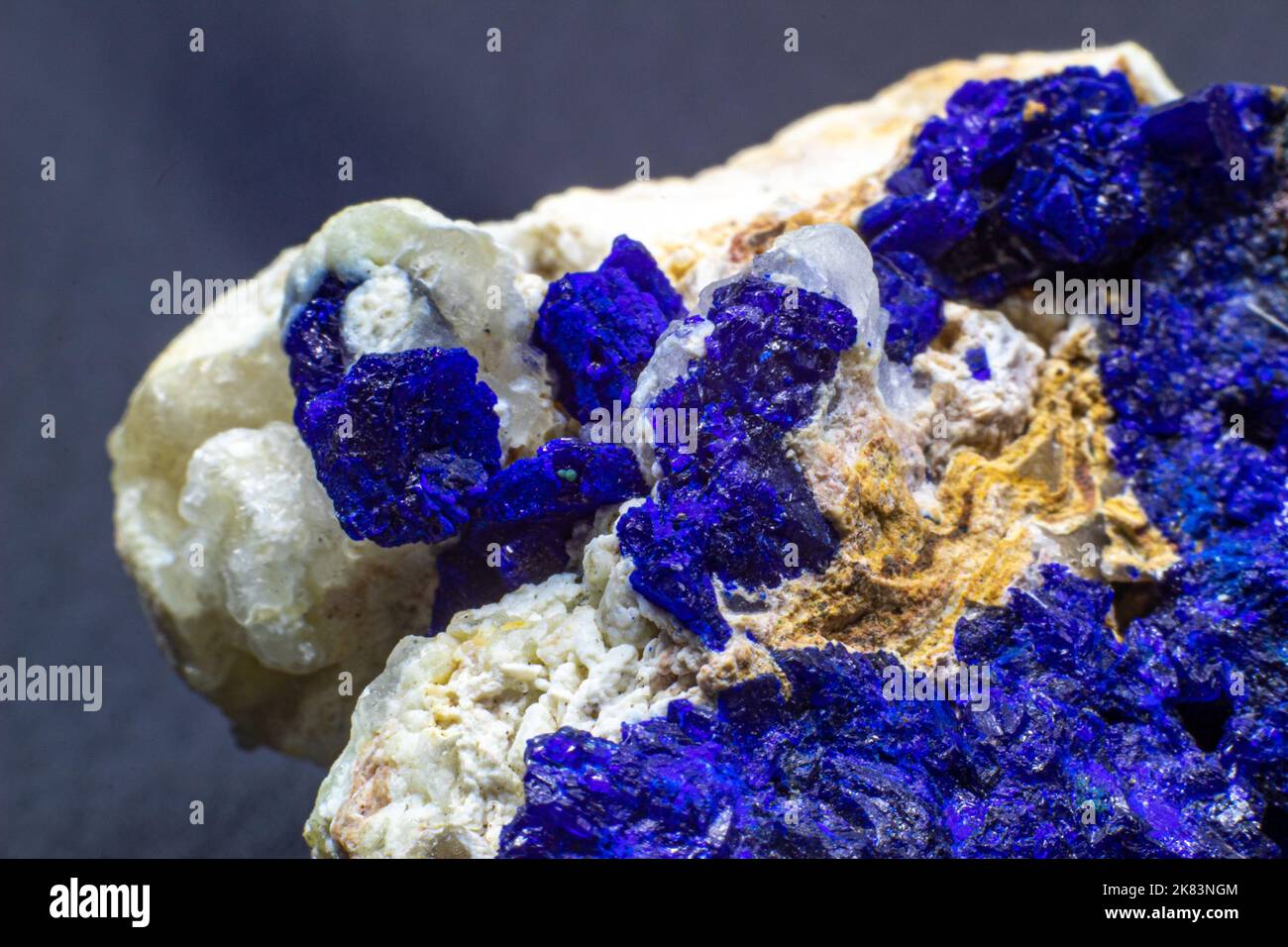 Macro blue azurite cluster on white matrix isolated crystal on black background Stock Photo