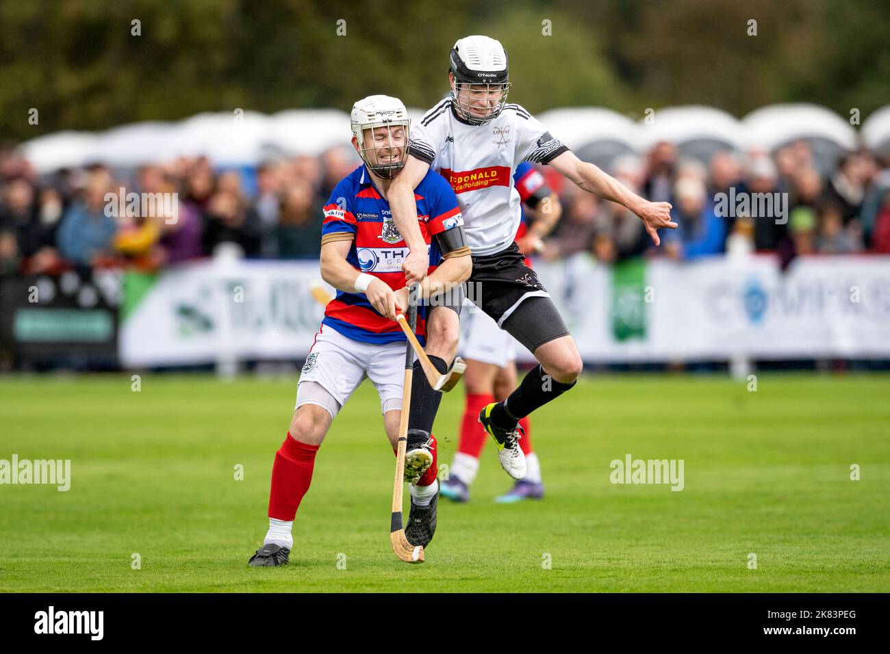 The game of shinty.  2022 Tulloch Homes Camanachd Cup Final, Lovat v Kingussie, played at The Dell, Kingussie. Stock Photo