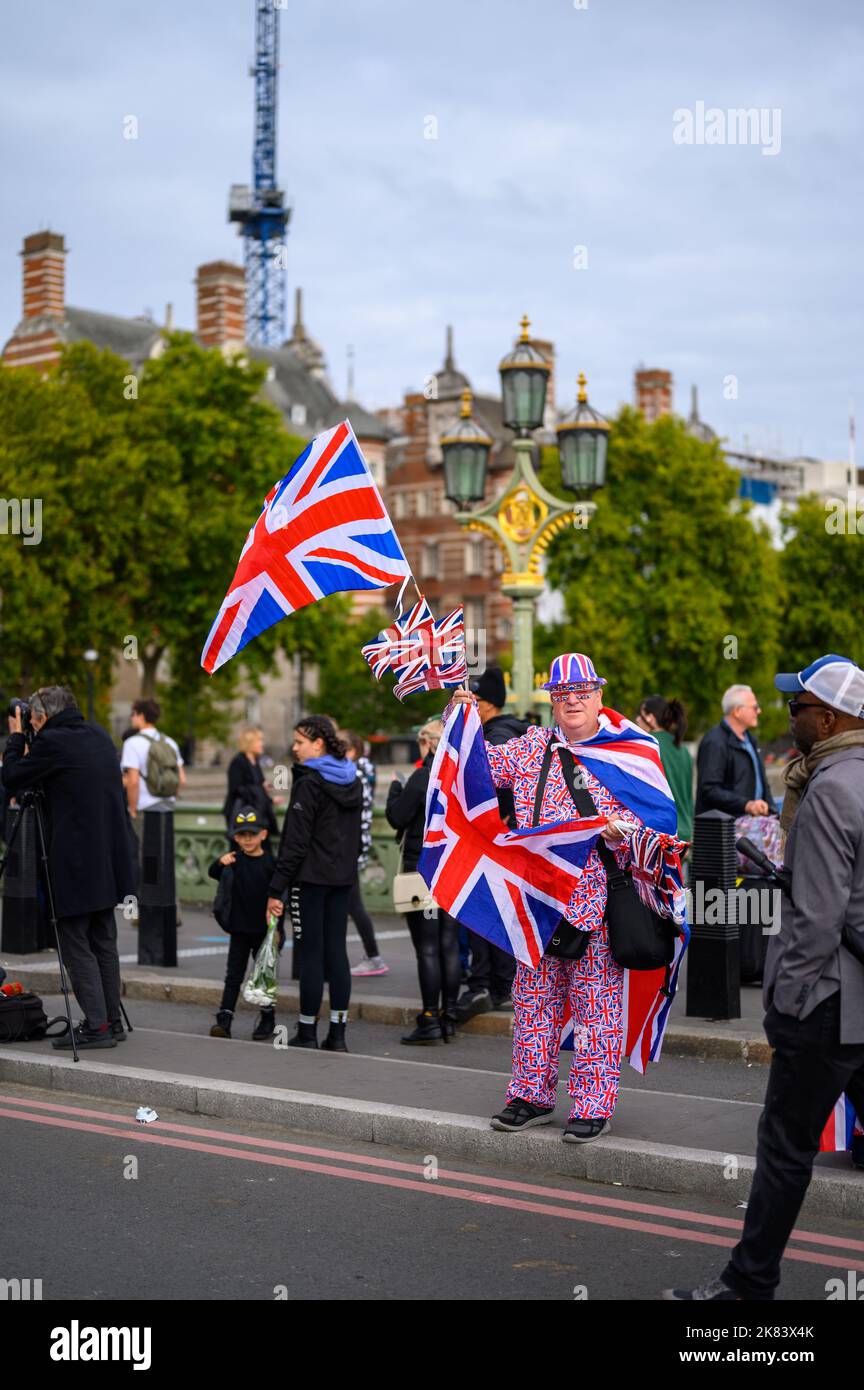 London September 19, 2022 Man dressed in Union Jack flags sells