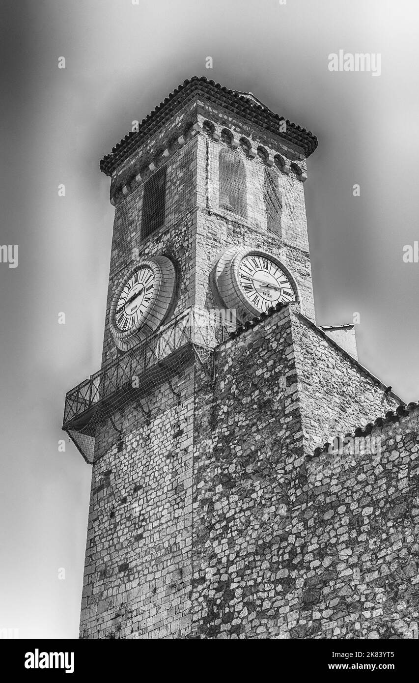 Clock and Belltower of the Church of Our Lady of Esperance, one of the major landmarks in Le Suquet medieval district in Cannes, Cote d'Azur, France Stock Photo