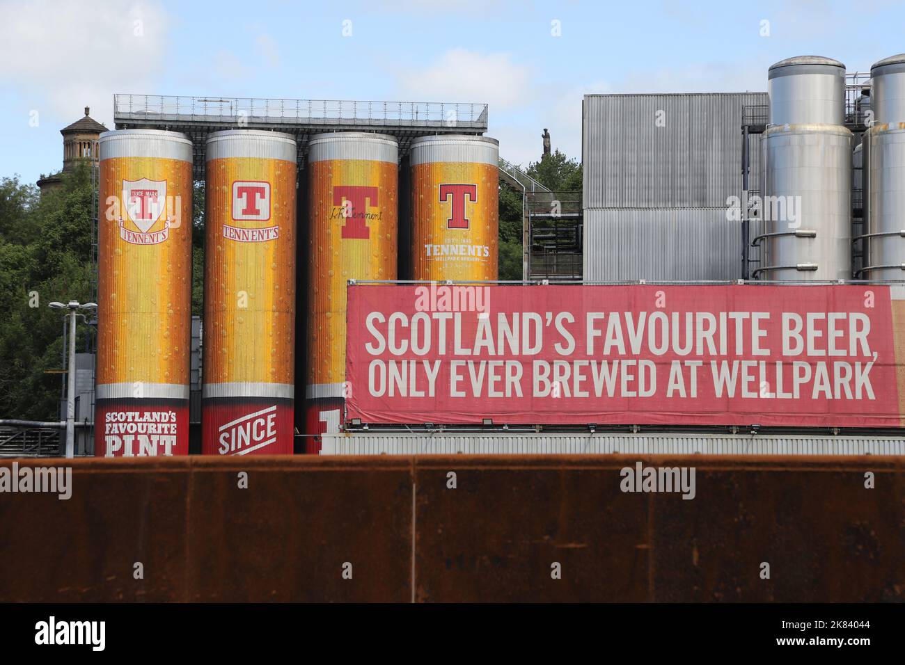 Painted storage tanks Tennent Caledonian Breweries Glasgow Scotland July 2022 Stock Photo