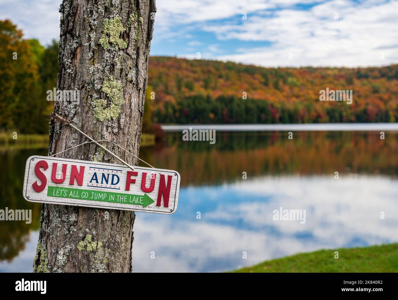 Perfectly calm Silver Lake in Barnard Vermont with humorous Jump in the