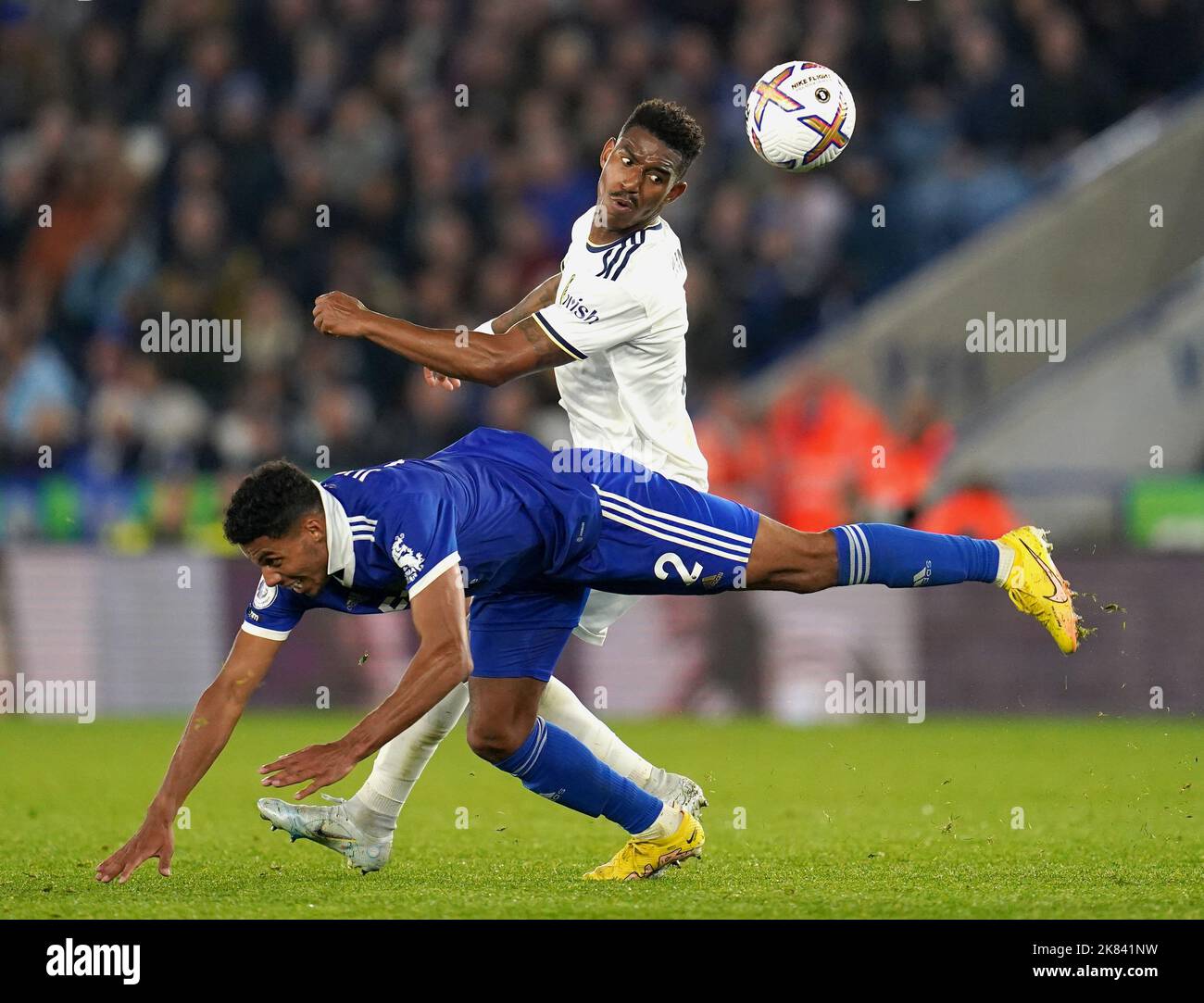 Leicester City's James Justin (left) and Leeds United's Junior Firpo battle for the ball during the Premier League match at the King Power Stadium, Leicester. Picture date: Thursday October 20, 2022. Stock Photo
