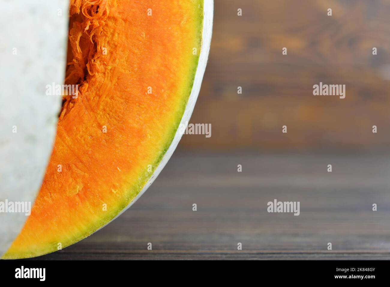 Pumpkin on wooden background with copy space Stock Photo