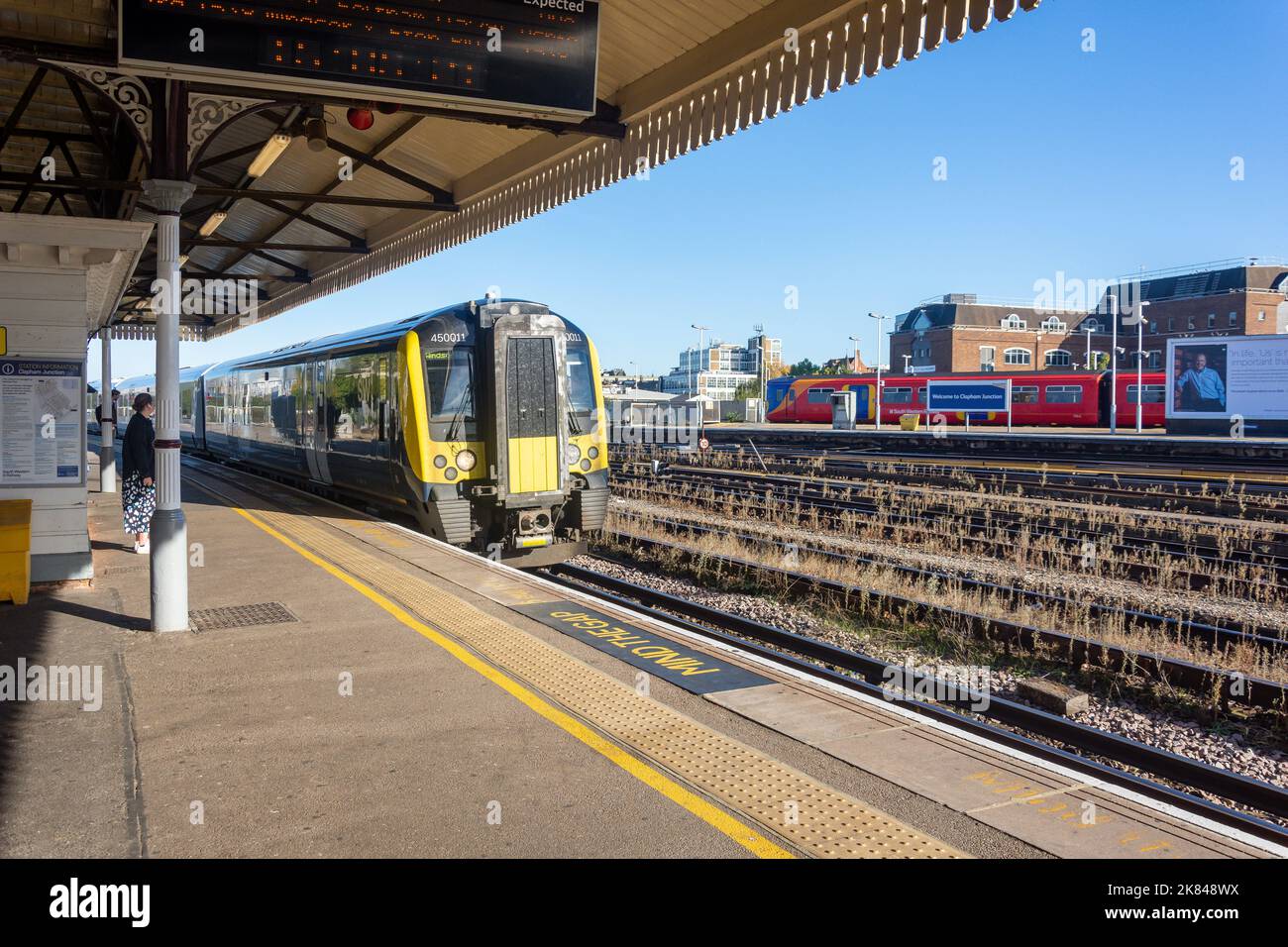 Train approaching platform, Clapham Junction Station, Battersea, London