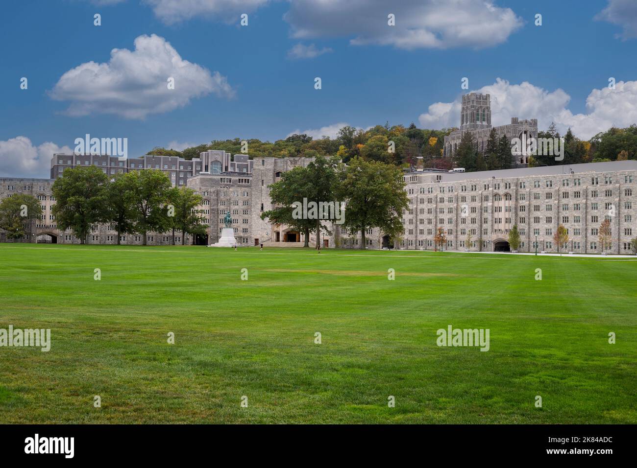 West Point, New York, USA.  U.S. Military Academy Main Dining Hall.  Protestant Chapel in background on Hillside. Stock Photo