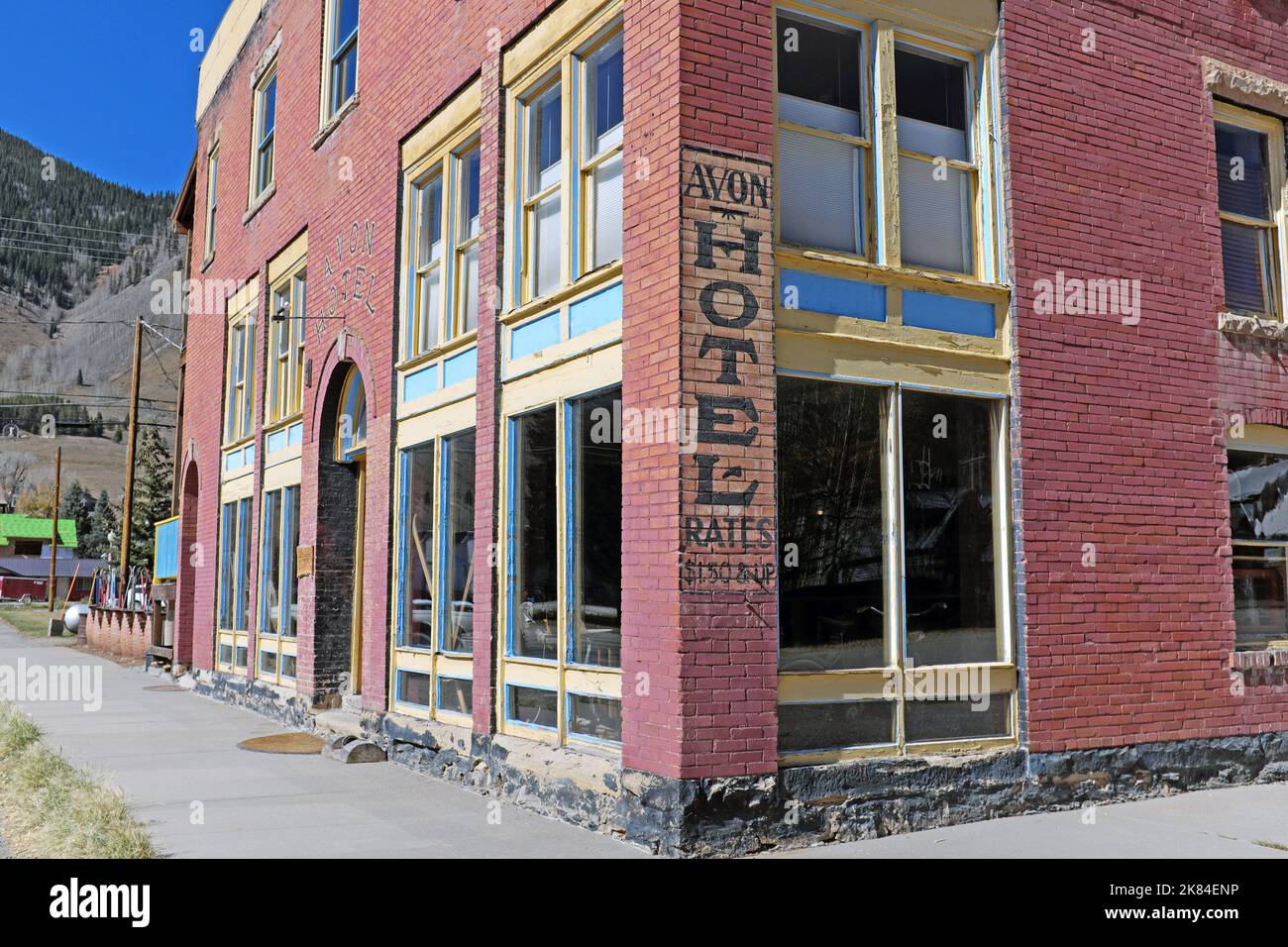 The Avon Hotel and Hostel in Silverton, Colorado was built in 1904 and restored in 2017. The vintage painted sign on the outside says rates 1.50 & up Stock Photo